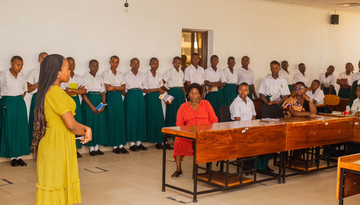 Girls participating in community learning and empowerment activities